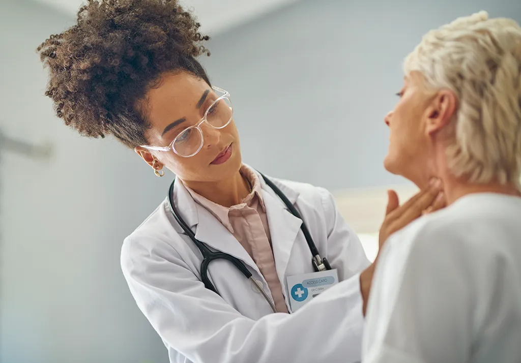 A provider examining a patient